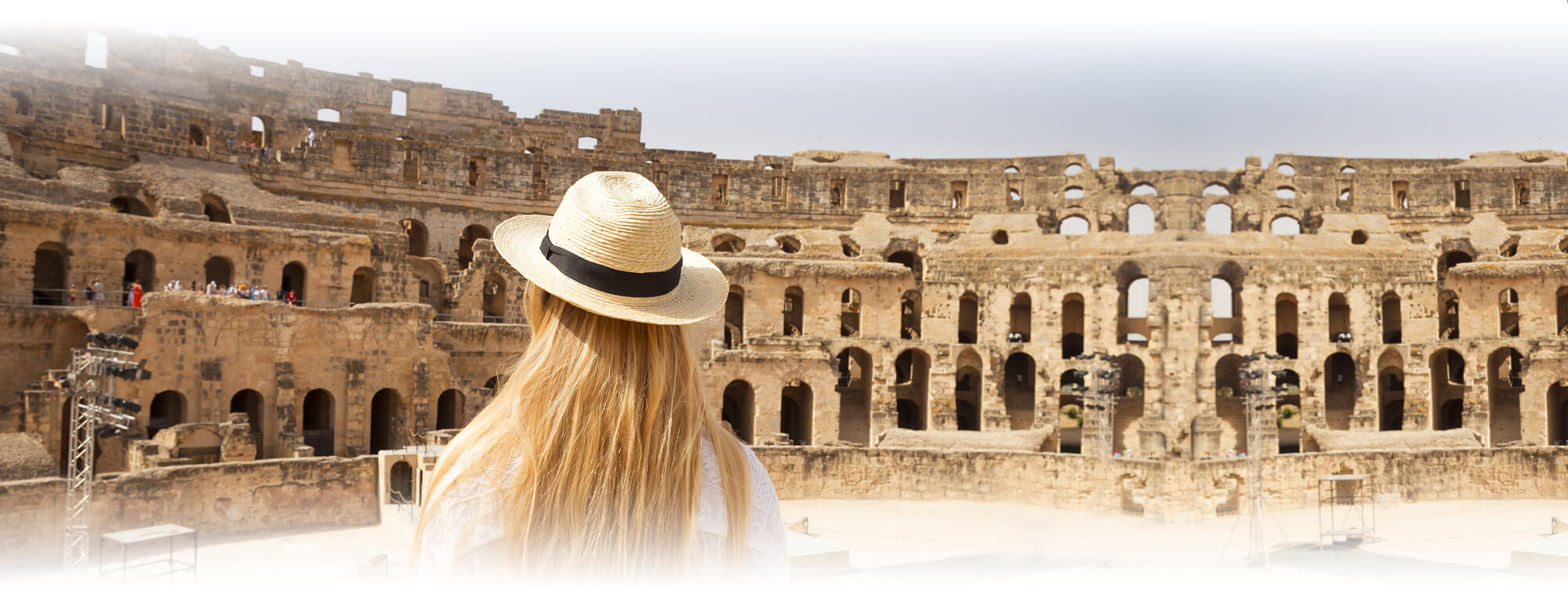high school girl standing in ancient ruins